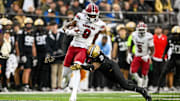 Nov 9, 2024; Nashville, Tennessee, USA;  South Carolina Gamecocks wide receiver Nyck Harbor (8) breaks the tackle of Vanderbilt Commodores linebacker Randon Fontenette (2) during the first half at FirstBank Stadium. Mandatory Credit: Steve Roberts-Imagn Images