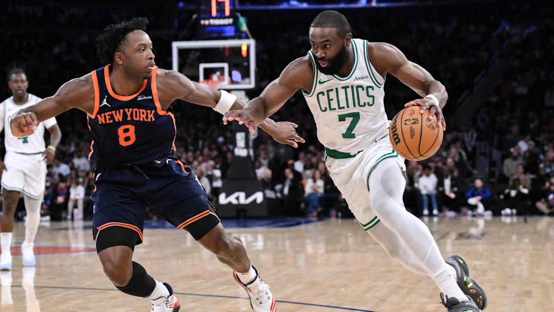 Apr 8, 2025; New York, New York, USA; Boston Celtics guard Jaylen Brown (7) drives past New York Knicks forward OG Anunoby (8) during the second half at Madison Square Garden. Mandatory Credit: John Jones-Imagn Images