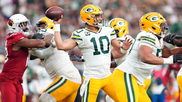 Oct 19, 2025; Glendale, Arizona, USA; Green Bay Packers quarterback Jordan Love (10) passes against the Arizona Cardinals during the second half at State Farm Stadium. Mandatory Credit: Joe Camporeale-Imagn Images