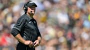 Purdue Boilermakers head coach Barry Odom stands on the sidelines 