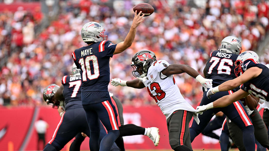Nov 9, 2025; Tampa, Florida, USA; New England Patriots quarterback Drake Maye (10) throws downfield during the second quarter against the Tampa Bay Buccaneers at Raymond James Stadium. Mandatory Credit: Jonathan Dyer-Imagn Images