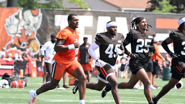 Aug 4, 2024; Cleveland Browns quarterback Deshaun Watson (4) and running back Aidan Robbins (49) and cornerback Kahlef Hailassie (25) run sprints at the end of practice at the Browns training facility in Berea, Ohio. Mandatory Credit: Bob Donnan-USA TODAY Sports