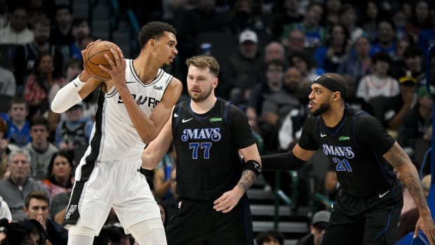 San Antonio Spurs center Victor Wembanyama, Dallas Mavericks Luka Doncic and Daniel Gaffor