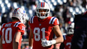 Dec 1, 2024; Foxborough, Massachusetts, USA; New England Patriots tight end Austin Hooper (81) warms up before a game against the Indianapolis Colts at Gillette Stadium. Mandatory Credit: Eric Canha-Imagn Images