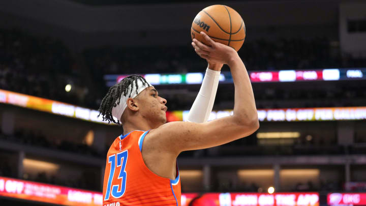 Dec 14, 2023; Sacramento, California, USA; Oklahoma City Thunder forward Ousmane Dieng (13) shoots against the Sacramento Kings during the third quarter at Golden 1 Center. Mandatory Credit: Darren Yamashita-USA TODAY Sports