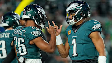 Former Penn State football and current Philadelphia Eagles RB Saquon Barkley with QB Jalen Hurts