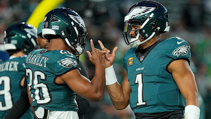 Former Penn State football and current Philadelphia Eagles RB Saquon Barkley with QB Jalen Hurts