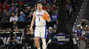 Florida is favored over Auburn in an All-SEC Final Four matchup.