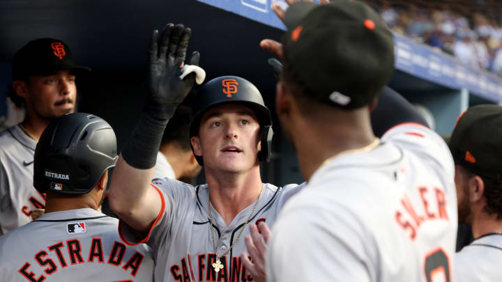 Jul 23, 2024; Los Angeles, California, USA; San Francisco Giants outfielder Tyler Fitzgerald (49) celebrates with teammates after hitting a home run during the second inning against the Los Angeles Dodgers at Dodger Stadium. Mandatory Credit: Jason Parkhurst-USA TODAY Sports