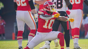 Dec 21, 2024; Kansas City, Missouri, USA; Kansas City Chiefs running back Isiah Pacheco (10) celebrates after a play against the Houston Texans during the first half at GEHA Field at Arrowhead Stadium. Mandatory Credit: Denny Medley-Imagn Images