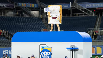 Dec 28, 2023; Orlando, FL, USA; Pop Tart mascot signals the end of the celebration after the game at Camping World Stadium. Mandatory Credit: Jeremy Reper-USA TODAY Sports