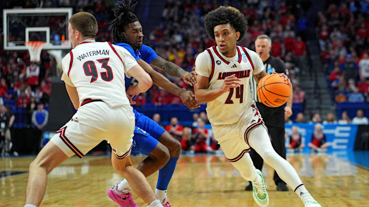 Mar 20, 2025; Lexington, KY, USA; Louisville Cardinals guard Chucky Hepburn (24) drives to the basket against Creighton Bluejays guard Jamiya Neal (5) during the first half in the first round of the NCAA Tournament at Rupp Arena. Mandatory Credit: Aaron Doster-Imagn Images Mar 20, 2025; Lexington, KY, USA; Louisville Cardinals guard Chucky Hepburn (24) drives to the basket against Creighton Bluejays guard Jamiya Neal (5) during the first half in the first round of the NCAA Tournament at Rupp Arena. Mandatory Credit: Aaron Doster-Imagn Images