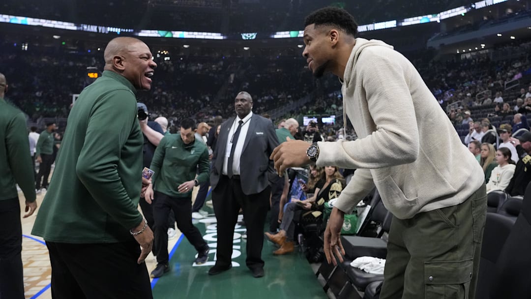 Apr 10, 2026; Milwaukee, Wisconsin, USA;  Milwaukee Bucks forward Giannis Antetokounmpo (34) talks with head coach Doc Rivers prior to the game against the Brooklyn Nets at Fiserv Forum. Mandatory Credit: Jeff Hanisch-Imagn Images