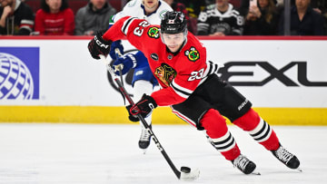 Feb 13, 2024; Chicago, Illinois, USA; Chicago Blackhawks forward Philipp Kurashev (23) controls the