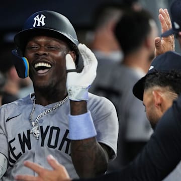 Jun 30, 2025; Toronto, Ontario, CAN; New York Yankees third baseman Jazz Chisholm Jr. (13) celebrates in the dugout after hitting a two-run home run against the Toronto Blue Jays during the fourth inning at Rogers Centre. Mandatory Credit: Nick Turchiaro-Imagn Images