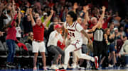 Louisville Cardinals guard Hepburn reacts after hitting a last second shot to win the game at Spectrum Center. 