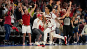 Mar 13, 2025; Charlotte, NC, USA; Louisville Cardinals guard Chucky Hepburn (24) reacts after hitting a last second shot to win the game at Spectrum Center. Mandatory Credit: Bob Donnan-Imagn Images