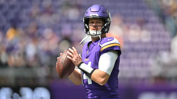 Aug 10, 2024; Minneapolis, Minnesota, USA; Minnesota Vikings quarterback Sam Darnold (14) warms up before the game against the Las Vegas Raiders at U.S. Bank Stadium. Mandatory Credit: Jeffrey Becker-USA TODAY Sports