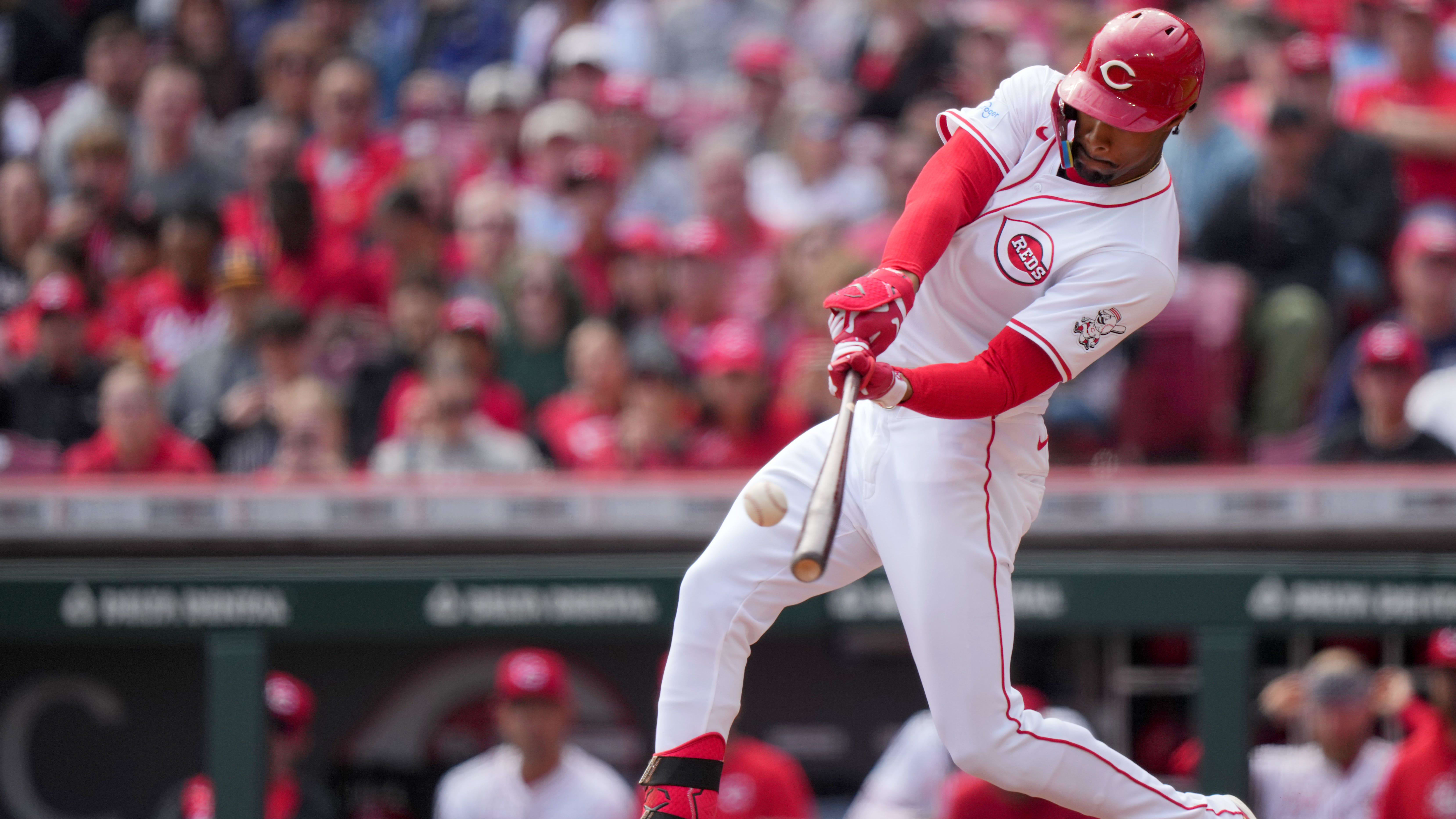 Cincinnati Reds center fielder Will Benson (30) hits an RBI double in the third inning against the Washington Nationals.
