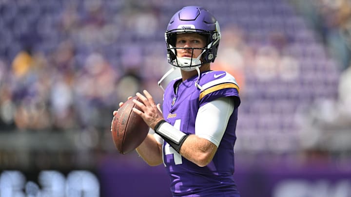 Aug 10, 2024; Minneapolis, Minnesota, USA; Minnesota Vikings quarterback Sam Darnold (14) warms up before the game against the Las Vegas Raiders at U.S. Bank Stadium. Mandatory Credit: Jeffrey Becker-Imagn Images