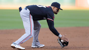 Jun 21, 2024; Oakland, California, USA; Minnesota Twins third base Royce Lewis (23) fields the ball against the Oakland Athletics during the third inning at Oakland-Alameda County Coliseum.