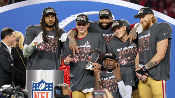 Jan 28, 2024; Santa Clara, California, USA; (Left to right) San Francisco 49ers linebacker Fred Warner (54), quarterback Brock Purdy (13), offensive tackle Trent Williams (71), wide receiver Deebo Samuel (19), running back Christian McCaffrey (23), tight end George Kittle (85) celebrate after winning the NFC Championship football game against the Detroit Lions at Levi's Stadium. Mandatory Credit: Kyle Terada-USA TODAY Sports