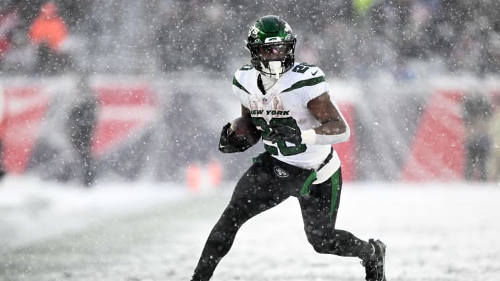 oJan 7, 2024; Foxborough, Massachusetts, USA; New York Jets running back Breece Hall (20) runs against the New England Patriots during the second half at Gillette Stadium. Mandatory Credit: Brian Fluharty-USA TODAY Sports