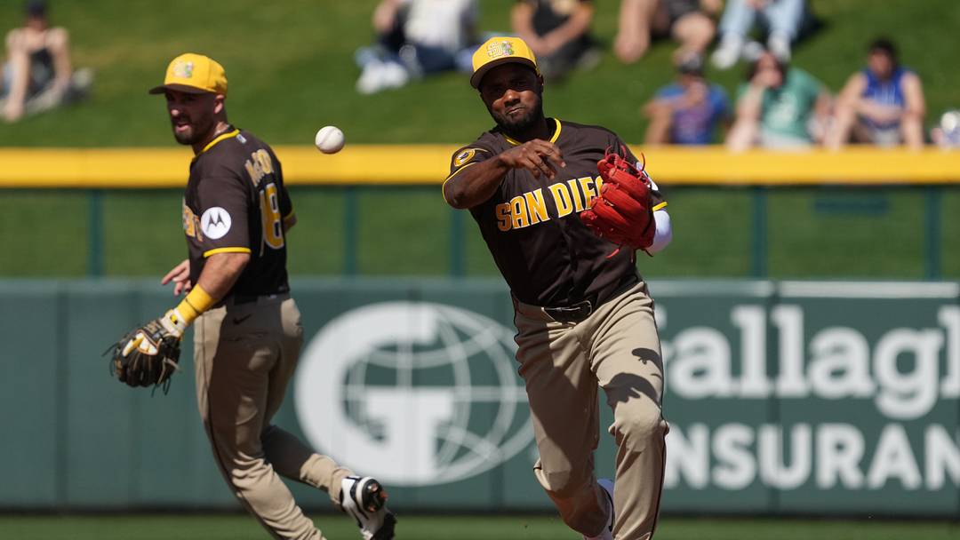 San Diego Padres infielder Pablo Reyes (26) makes the play for an out against the Chicago Cubs in the first inning at Sloan Park on Feb. 24, 2026.