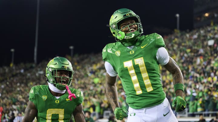Nov 24, 2023; Eugene, Oregon, USA; Oregon Ducks wide receiver Troy Franklin (11) celebrates after catching a pass for a touchdown during the first half against the Oregon State Beavers at Autzen Stadium. Mandatory Credit: Troy Wayrynen-USA TODAY Sports