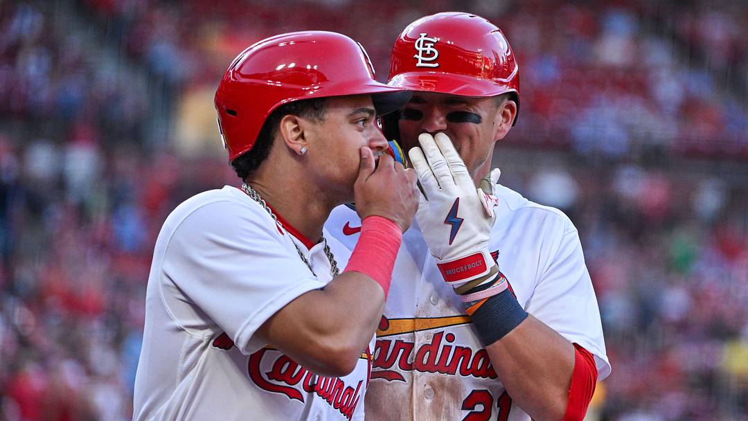 Jun 15, 2026; St. Louis, Missouri, USA; St. Louis Cardinals shortstop Masyn Winn (0) talks with left fielder Lars Nootbaar (21) after they both scored against the San Diego Padres during the fourth inning at Busch Stadium. Mandatory Credit: Jeff Curry-Imagn Images