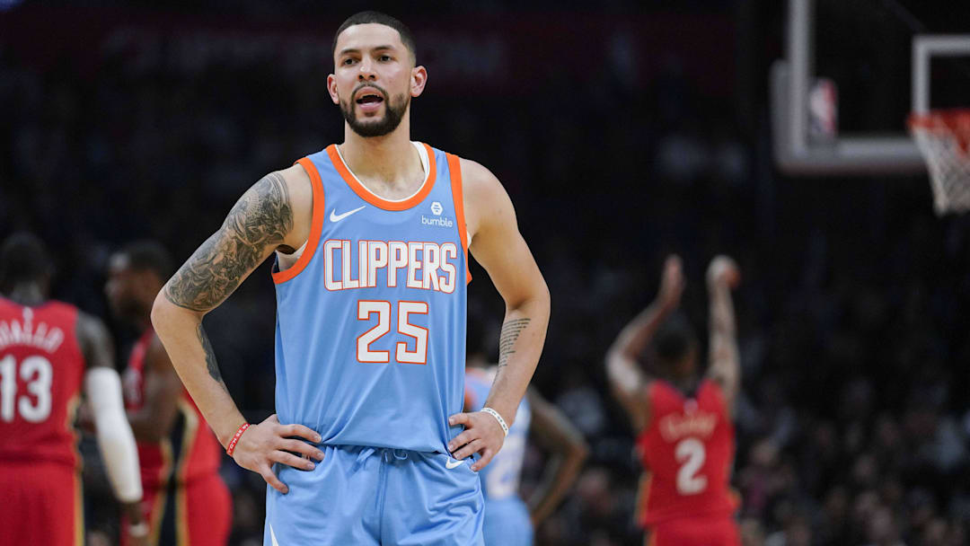 Mar 6, 2018; Los Angeles, CA, USA; Los Angeles Clippers guard Austin Rivers (25) reacts after a technical foul as New Orleans Pelicans guard Ian Clark (2) attempts a free throw during the second quarter at Staples Center. Mandatory Credit: Kelvin Kuo-Imagn Images