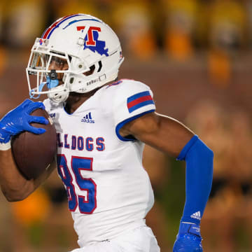 Sep 1, 2022; Columbia, Missouri, USA; Louisiana Tech Bulldogs wide receiver Cyrus Allen (85) runs for a touchdown against the Missouri Tigers during the second half at Faurot Field at Memorial Stadium. Mandatory Credit: Jay Biggerstaff-USA TODAY Sports