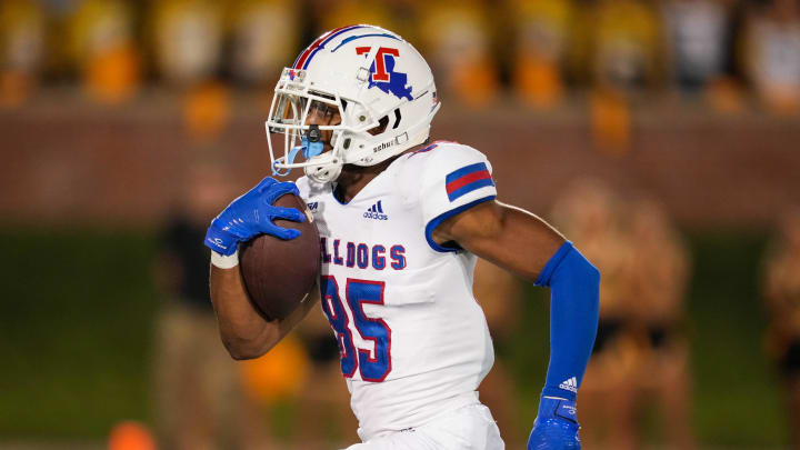 Sep 1, 2022; Columbia, Missouri, USA; Louisiana Tech Bulldogs wide receiver Cyrus Allen (85) runs for a touchdown against the Missouri Tigers during the second half at Faurot Field at Memorial Stadium. Mandatory Credit: Jay Biggerstaff-USA TODAY Sports