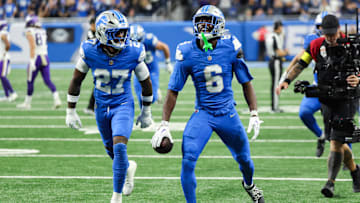 Detroit Lions cornerback Terrion Arnold (6) celebrates an interception in the second quarter against the Minnesota Vikings at Ford Field.