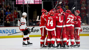 Jan 7, 2025; Detroit, Michigan, USA; Detroit Red Wings right wing Patrick Kane (88) receives congratulations from teammates after scoring in overtime against the Ottawa Senators at Little Caesars Arena. Mandatory Credit: Rick Osentoski-Imagn Images