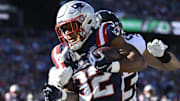 Nov 2, 2025; Foxborough, Massachusetts, USA; New England Patriots running back TreVeyon Henderson (32) runs the ball against the Atlanta Falcons during the first quarter at Gillette Stadium. 