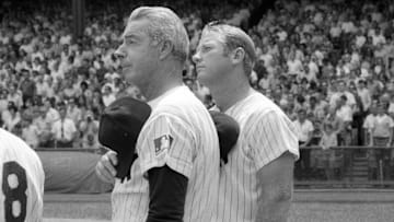 August 8, 1970; New York, NY, USA; Yankees Old Timers Joe DiMaggio and Mickey Mantle pause for the national anthem at the start of the annual Old-Timers' Day game at Yankee Stadium 