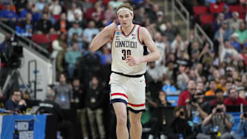 Mar 21, 2025; Raleigh, NC, USA; Connecticut Huskies forward Liam McNeeley (30) reacts during the first half against the Oklahoma Sooners at Lenovo Center. Mandatory Credit: Bob Donnan-Imagn Images