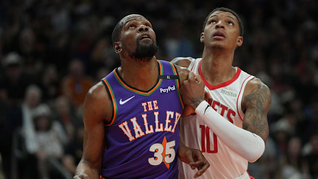 Phoenix Suns forward Kevin Durant (35) and Houston Rockets forward Jabari Smith Jr. fight for position