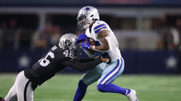 Dallas Cowboys wide receiver Jalen Moreno-Cropper (16) catches a pass while defended by Las Vegas Raiders cornerback Ike Brow