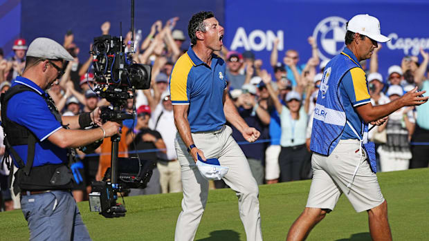 Team Europe golfer Rory McIlroy celebrates after beating Sam Burns during the final day of the 44th Ryder Cup 