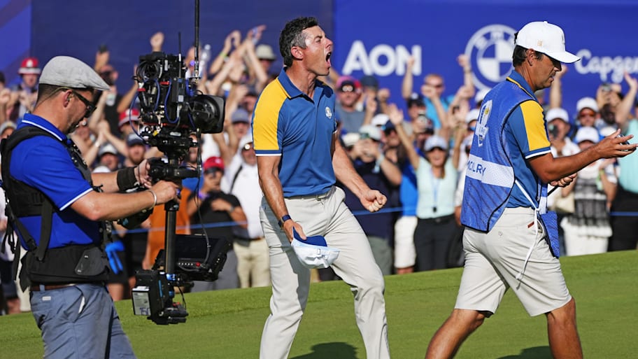 Team Europe golfer Rory McIlroy celebrates after beating Sam Burns during the final day of the 44th Ryder Cup 