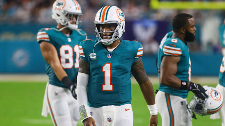 Miami Dolphins quarterback Tua Tagovailoa (1) looks on from the sideline against the Buffalo Bills during the second quarter at Hard Rock Stadium.