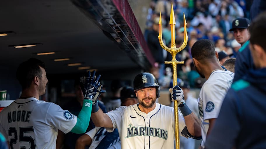 Cal Raleigh celebrates a home run against the Nationals. | Stephen Brashear-Imagn Images