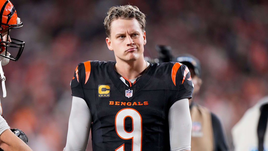 Cincinnati Bengals quarterback Joe Burrow (9) celebrates after the game-winning touchdown pass to Tee Higgins in overtime of the NFL Week 17 game between the Cincinnati Bengals and the Denver Broncos at Paycor Stadium in downtown Cincinnati on Saturday, Dec. 28, 2024. The Bengals took a 30-24 win in overtime to remain in the post season chase.