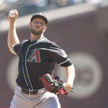 Sep 5, 2024; San Francisco, California, USA;  Arizona Diamondbacks pitcher Merrill Kelly (29) pitches during the second inning against the San Francisco Giants at Oracle Park. Mandatory Credit: Stan Szeto-Imagn Images