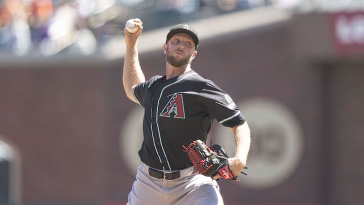 Sep 5, 2024; San Francisco, California, USA;  Arizona Diamondbacks pitcher Merrill Kelly (29) pitches during the second inning against the San Francisco Giants at Oracle Park. Mandatory Credit: Stan Szeto-Imagn Images