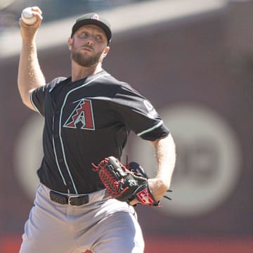 Sep 5, 2024; San Francisco, California, USA;  Arizona Diamondbacks pitcher Merrill Kelly (29) pitches during the second inning against the San Francisco Giants at Oracle Park. Mandatory Credit: Stan Szeto-Imagn Images