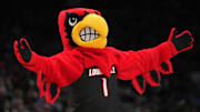 Mar 26, 2023; Seattle, WA, USA; Louisville Cardinals mascot Louie gestures in the first half against the Iowa Hawkeyes at Climate Pledge Arena. Mandatory Credit: Kirby Lee-Imagn Images