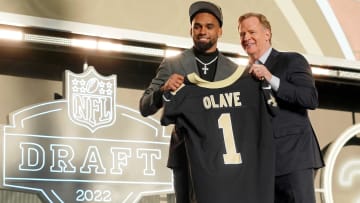 Apr 28, 2022; Las Vegas, NV, USA; Ohio State wide receiver Chris Olave with NFL commissioner Roger Goodell after being selected as the eleventh overall pick to the New Orleans Saints during the first round of the 2022 NFL Draft at the NFL Draft Theater. Mandatory Credit: Kirby Lee-USA TODAY Sports